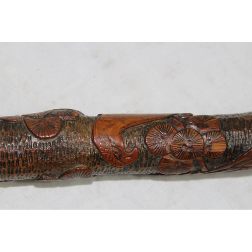 284 - LATE 19TH EARLY 20TH CENTURY CARVED ORIENTAL BAMBOO WALKING STICK
86CM