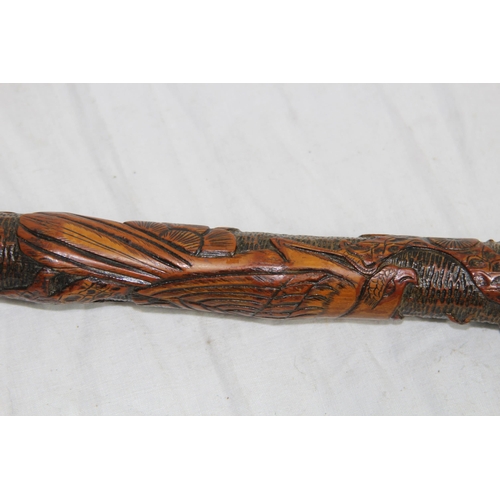 284 - LATE 19TH EARLY 20TH CENTURY CARVED ORIENTAL BAMBOO WALKING STICK
86CM