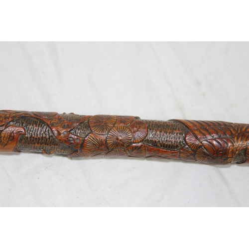 284 - LATE 19TH EARLY 20TH CENTURY CARVED ORIENTAL BAMBOO WALKING STICK
86CM