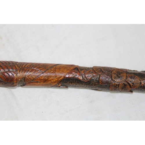 284 - LATE 19TH EARLY 20TH CENTURY CARVED ORIENTAL BAMBOO WALKING STICK
86CM