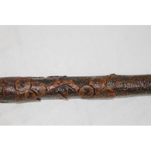 284 - LATE 19TH EARLY 20TH CENTURY CARVED ORIENTAL BAMBOO WALKING STICK
86CM