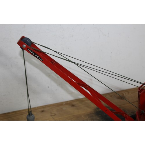 599 - VINTAGE TRI ANG TINPLATE KL44 CRANE
38CM HIGH