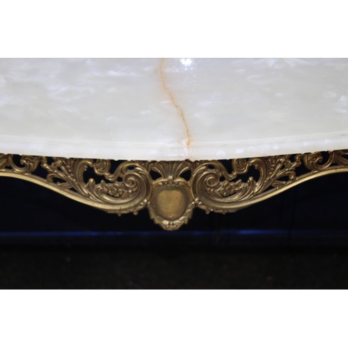 32A - 4 X ORNATE BRASS AND ALABASTA TABLES INCLUDING LARGE DEMI LUNE 2 A/F TOPS
106 X 80 X 33CM