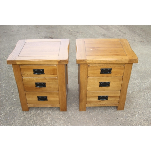 83 - PAIR OF OAK FURNITURELAND OAK BEDSIDE TABLES 
50 X 42 X 60CM