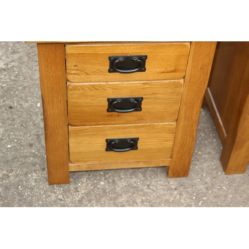 83 - PAIR OF OAK FURNITURELAND OAK BEDSIDE TABLES 
50 X 42 X 60CM