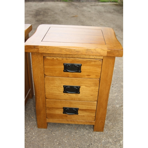 83 - PAIR OF OAK FURNITURELAND OAK BEDSIDE TABLES 
50 X 42 X 60CM