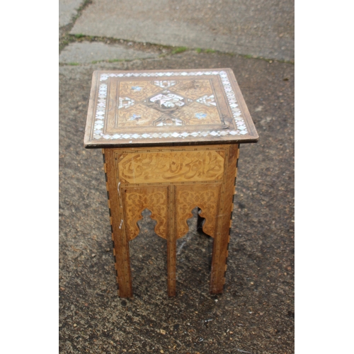 24 - MOORISH INLAID MAHOGANY OCCASIONAL TABLE WITH MOTHER OF PEARL AND MARQUETRY ARABIC SCRIPT 
45 X 64CM