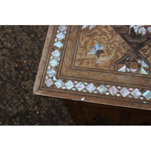 24 - MOORISH INLAID MAHOGANY OCCASIONAL TABLE WITH MOTHER OF PEARL AND MARQUETRY ARABIC SCRIPT 
45 X 64CM