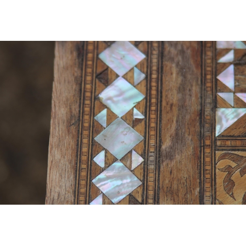 24 - MOORISH INLAID MAHOGANY OCCASIONAL TABLE WITH MOTHER OF PEARL AND MARQUETRY ARABIC SCRIPT 
45 X 64CM