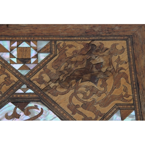 24 - MOORISH INLAID MAHOGANY OCCASIONAL TABLE WITH MOTHER OF PEARL AND MARQUETRY ARABIC SCRIPT 
45 X 64CM