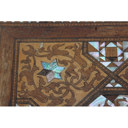 24 - MOORISH INLAID MAHOGANY OCCASIONAL TABLE WITH MOTHER OF PEARL AND MARQUETRY ARABIC SCRIPT 
45 X 64CM