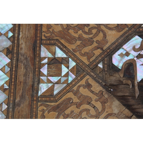 24 - MOORISH INLAID MAHOGANY OCCASIONAL TABLE WITH MOTHER OF PEARL AND MARQUETRY ARABIC SCRIPT 
45 X 64CM