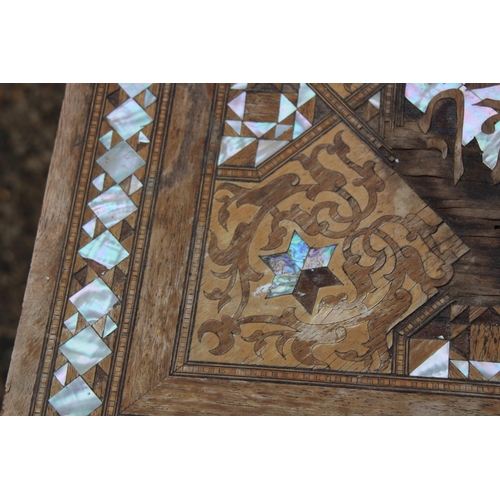 24 - MOORISH INLAID MAHOGANY OCCASIONAL TABLE WITH MOTHER OF PEARL AND MARQUETRY ARABIC SCRIPT 
45 X 64CM