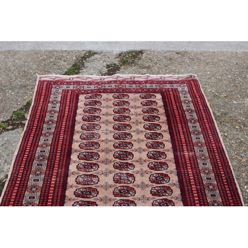 284 - VINTAGE EASTERN RUG
188 X 126CM