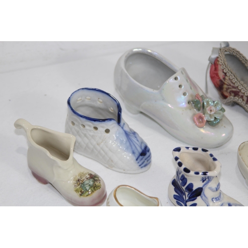 296 - QUANTITY OF MINIATURE CHINA SHOES