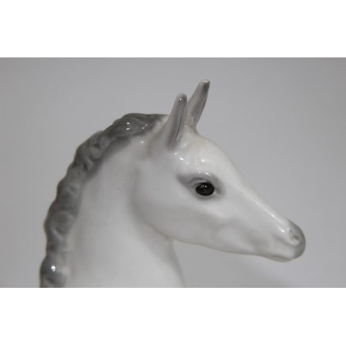 851 - USSR FIGURE OF A YOUNG HORSE SITTING 
14 X 11CM