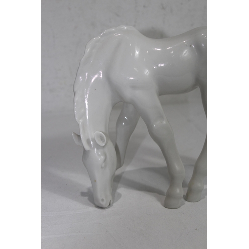 852 - USSR FIGURE OF A HORSE GRAZING 
20 X 24CM