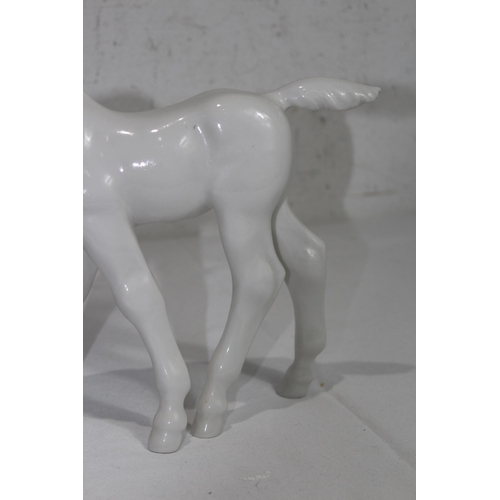 852 - USSR FIGURE OF A HORSE GRAZING 
20 X 24CM