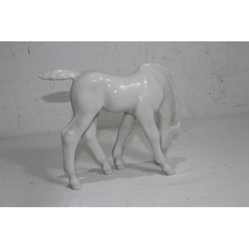 852 - USSR FIGURE OF A HORSE GRAZING 
20 X 24CM