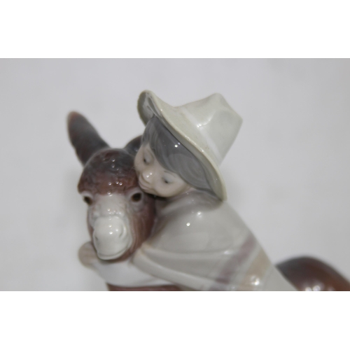 857 - LLADRO FIGURE OF A BOY AND DONKEY
20 X 16CM