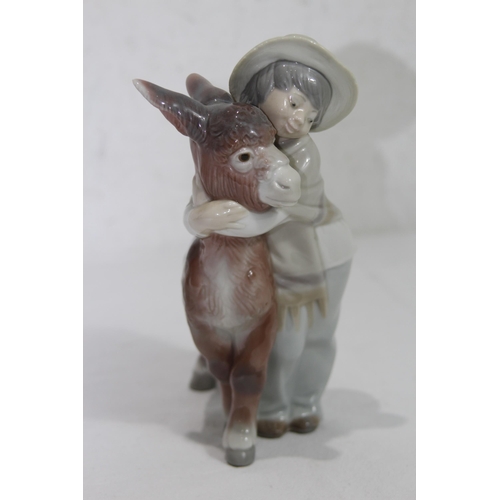 857 - LLADRO FIGURE OF A BOY AND DONKEY
20 X 16CM