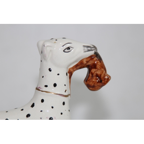 864 - STAFFORDSHIRE DOG WITH HARE 
19 X 18CM