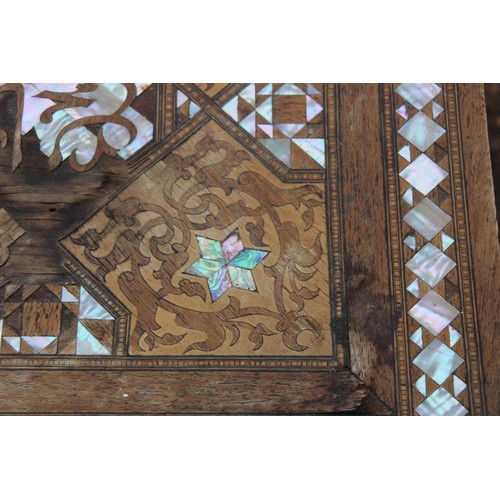 24 - MOORISH INLAID MAHOGANY OCCASIONAL TABLE WITH MOTHER OF PEARL AND MARQUETRY ARABIC SCRIPT 
45 X 64CM