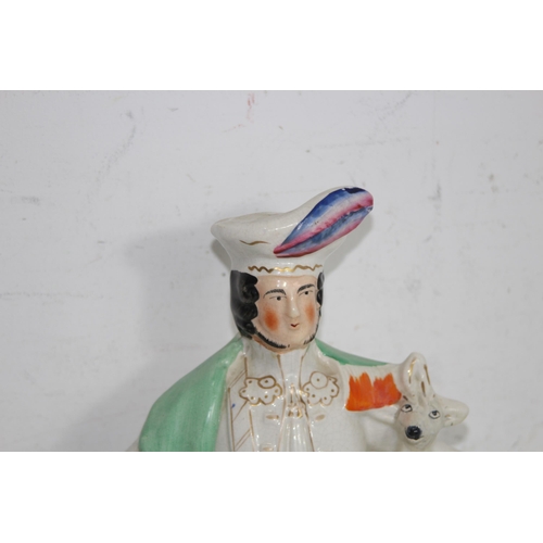 308 - STAFFORDSHIRE STYLE FIGURE OF A SCOTTISH HUNTSMAN - A/F
46CM