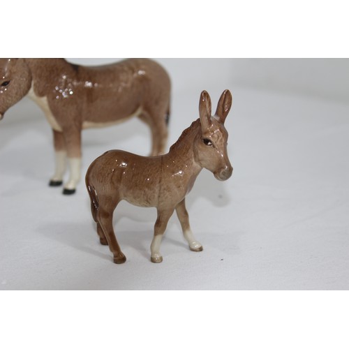 868 - 2 X BESWICK DONKEY FIGURES 
18 X 14CM