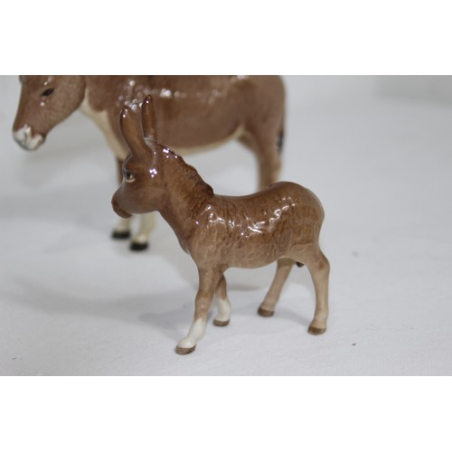 868 - 2 X BESWICK DONKEY FIGURES 
18 X 14CM