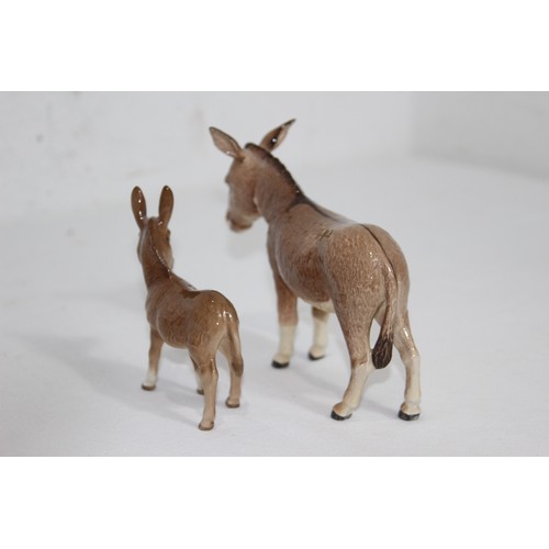 868 - 2 X BESWICK DONKEY FIGURES 
18 X 14CM