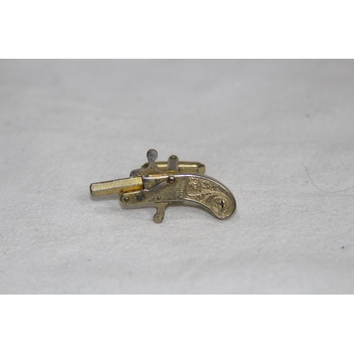 1023 - PAIR OF PISTOL CUFFLINKS