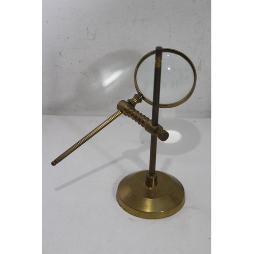 429 - METAL GALLEON AND BRASS MAGNIFYING GLASS
23 X 20CM