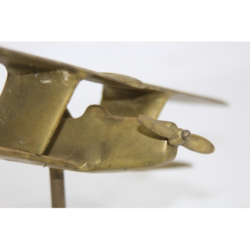 440 - MODEL OF A BRASS BIPLANE
27 X 23CM