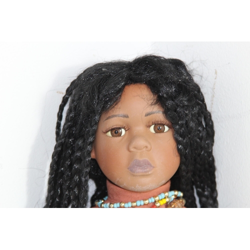 669 - LARGE ETHNIC DOLL
57CM