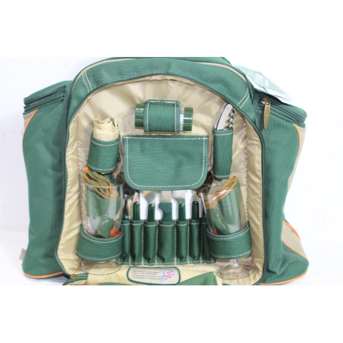 453 - BRAND NEW PICNIC BACKPACK AND CONTENTS
45 X 45CM