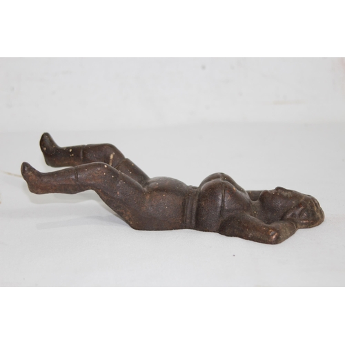 456 - ANTIQUE CAST BOOT REMOVER SHAPED AS A SAUCY LADY
24CM