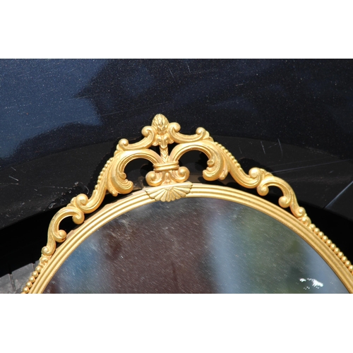 154 - ORNATE BRASS MIRROR
76 X 44CM