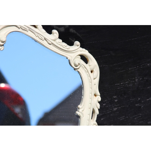 214 - PAINTED ORNATE FRAMED MIRROR 
82 X 57CM