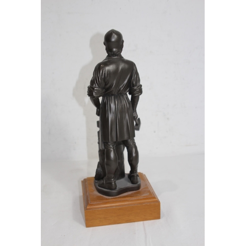 914 - REGIMENTAL STATUE OF A BLACKSMITH
34CM