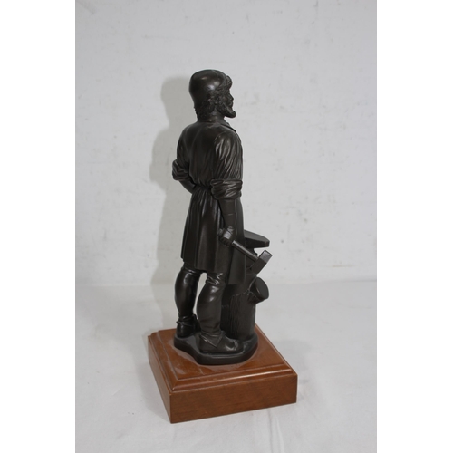 914 - REGIMENTAL STATUE OF A BLACKSMITH
34CM