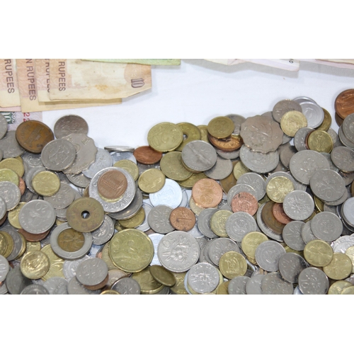 992 - LARGE QUANTITY OF FOREIGN COINS AND NOTES