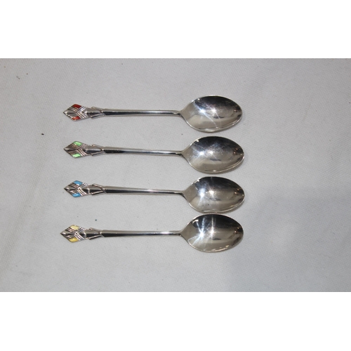 1063 - 4 ART DECO SILVER AND ENAMEL SPOONS IN CASE