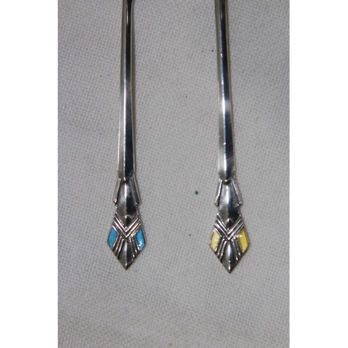 1063 - 4 ART DECO SILVER AND ENAMEL SPOONS IN CASE