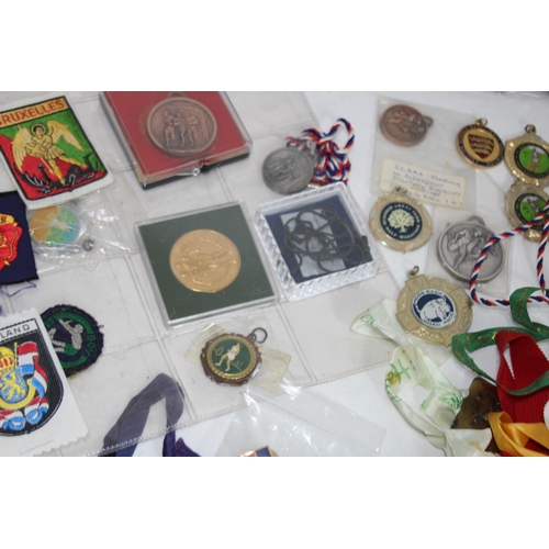 497 - LARGE QUANTITY OF SPORTING MEDALS ETC