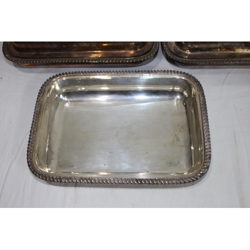 517 - QUANTITY OF METAL SERVING DISHES 
30 X 22CM