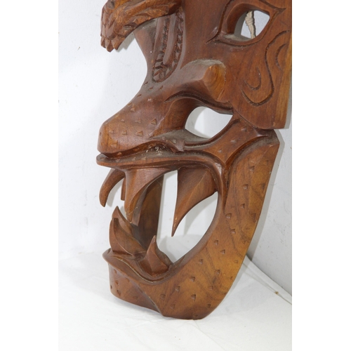 532 - ETHNIC MASK AND LARGE WOODEN SPOON AND FORK
94CM