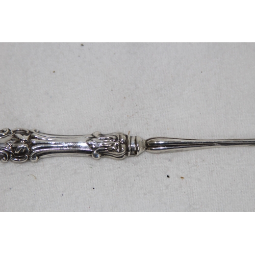 1067 - SOLID SILVER PICKLE FORK