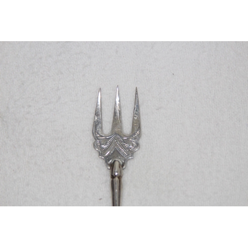 1067 - SOLID SILVER PICKLE FORK