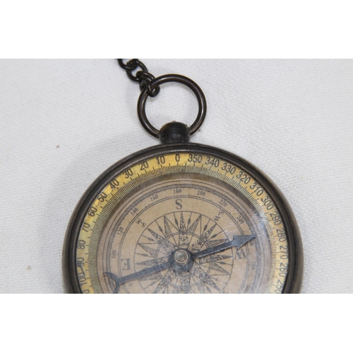 528 - HENRY HUGHES 1941 COMPASS ON CHAIN AND BAROMETER CLOCK
25 X 13CM